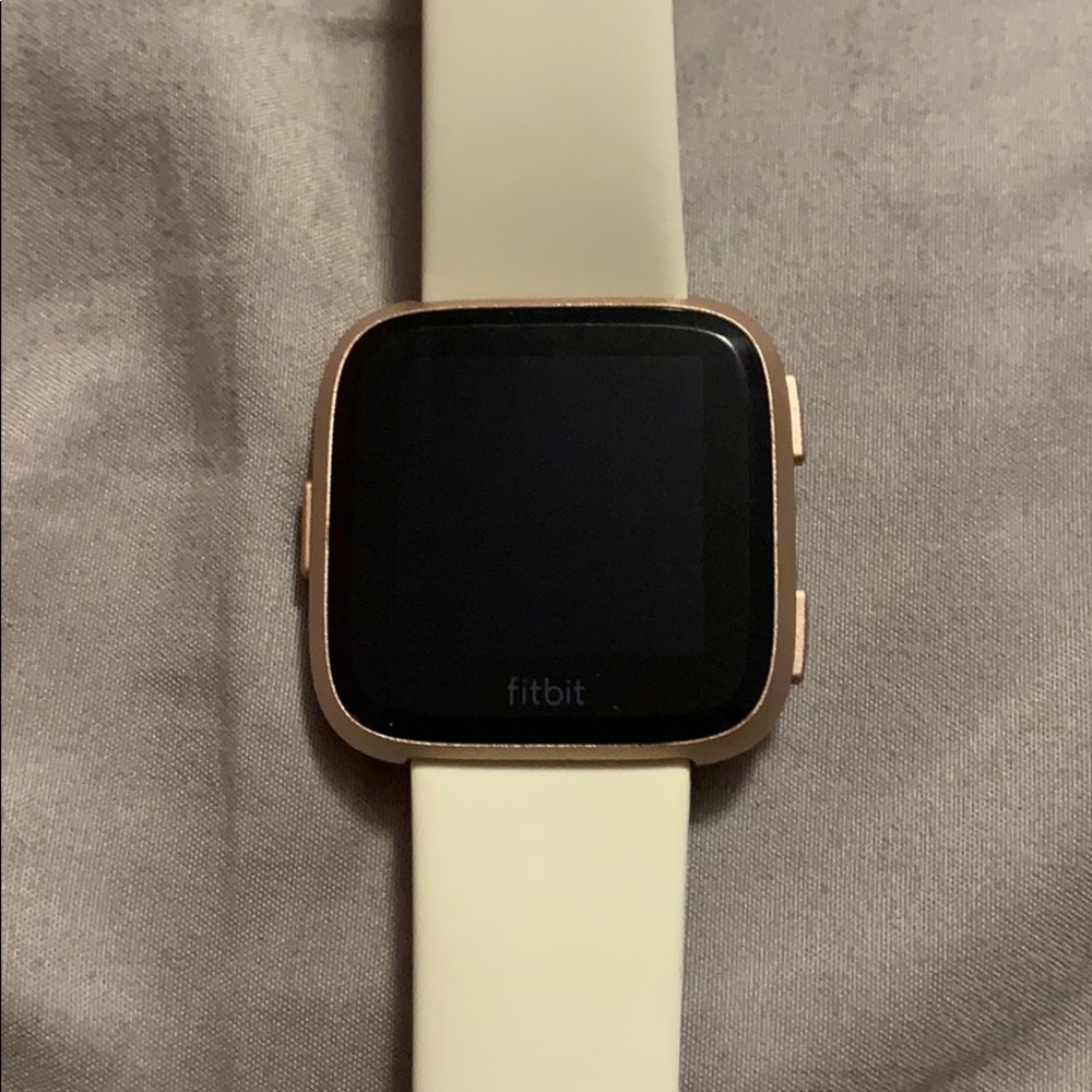 Fitbit Versa with accessories